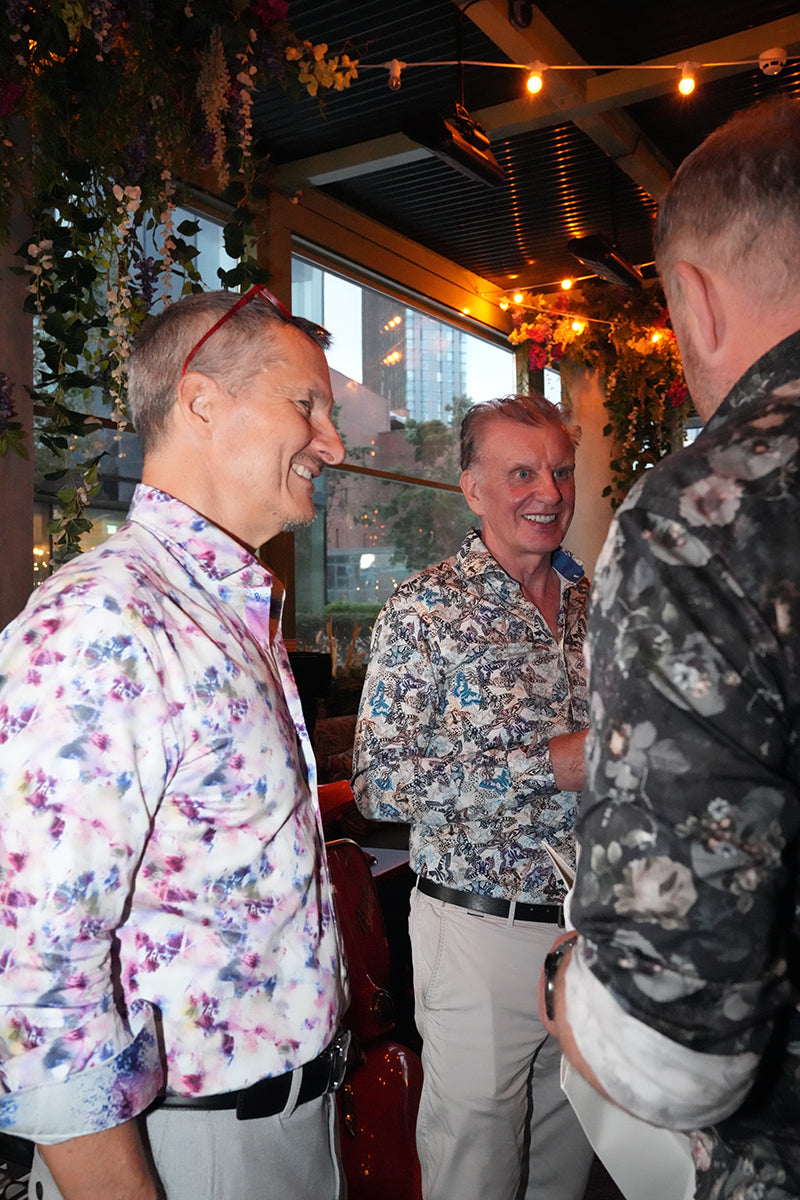 Guests talking in a bar at a Blake Mill event