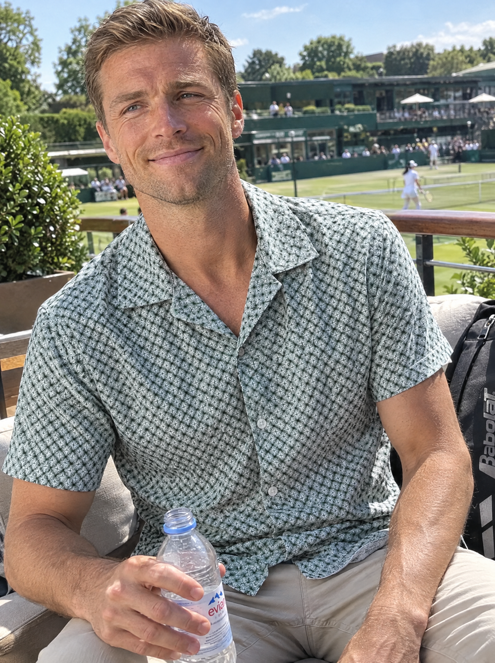 Man wearing the Emerald Wavy Geo Open Collar shirt at a tennis club