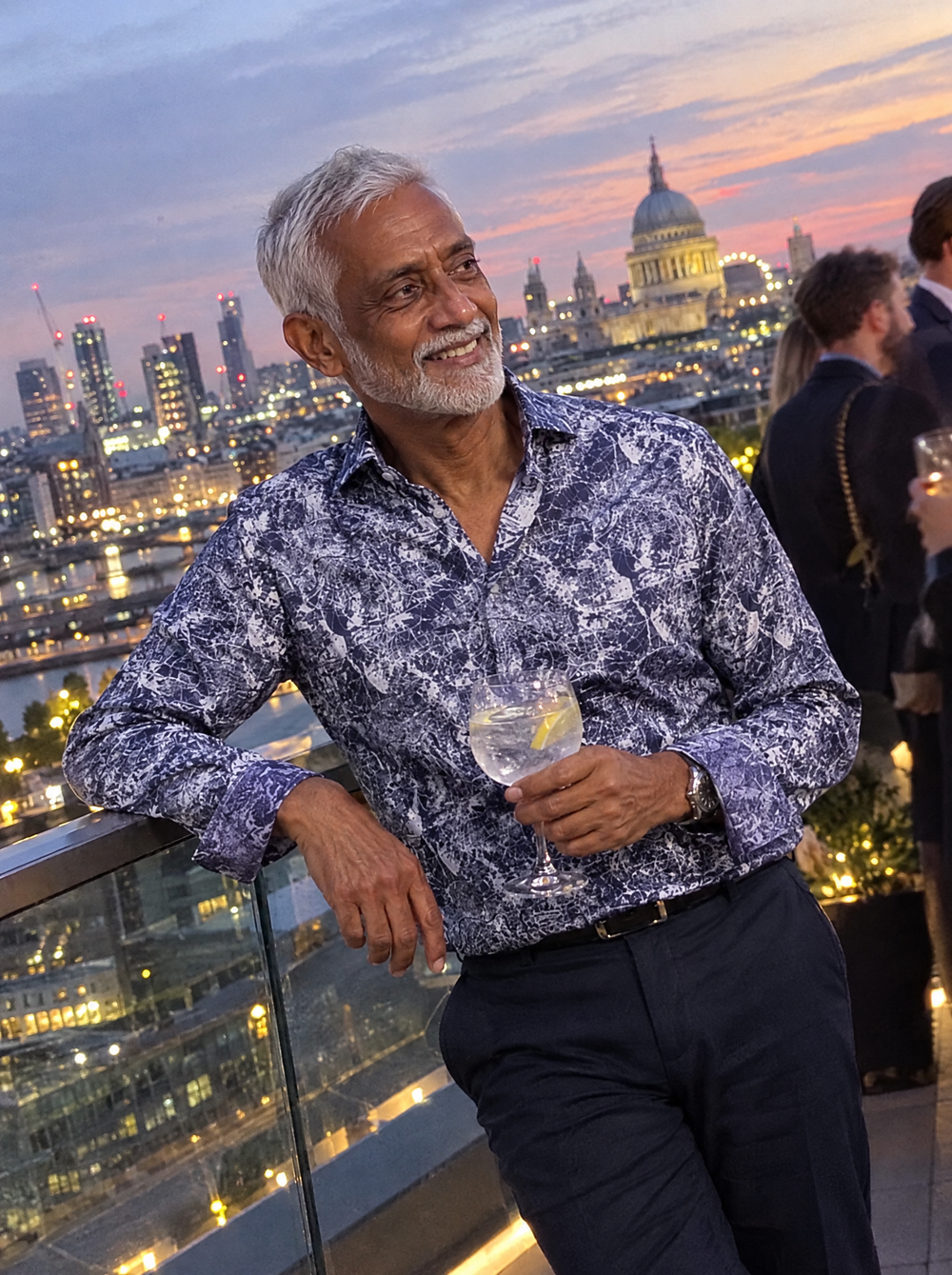 Man wearing the London shirt at a rooftop bar
