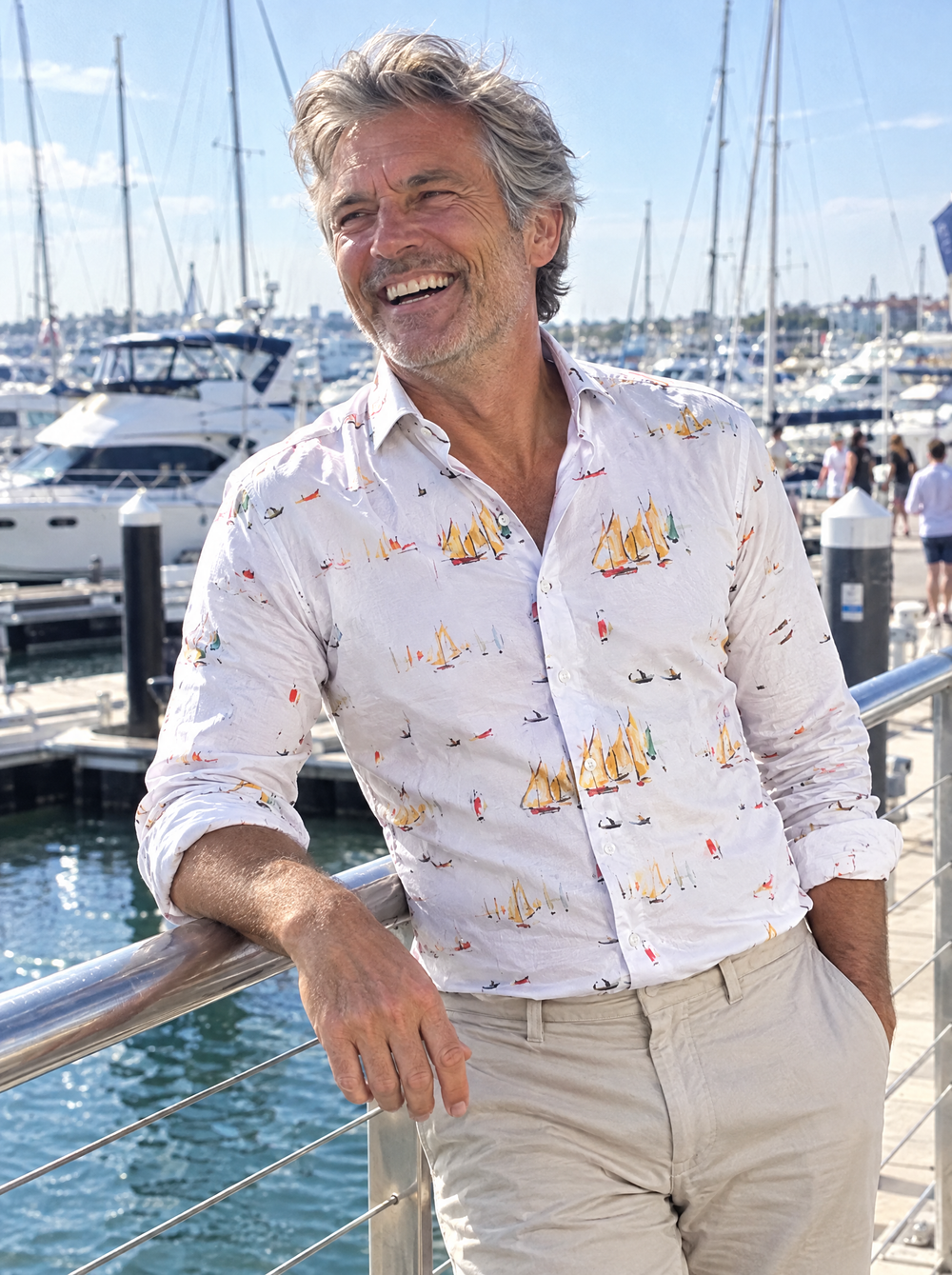 Man wearing the Lowry Yachts shirt at a marina