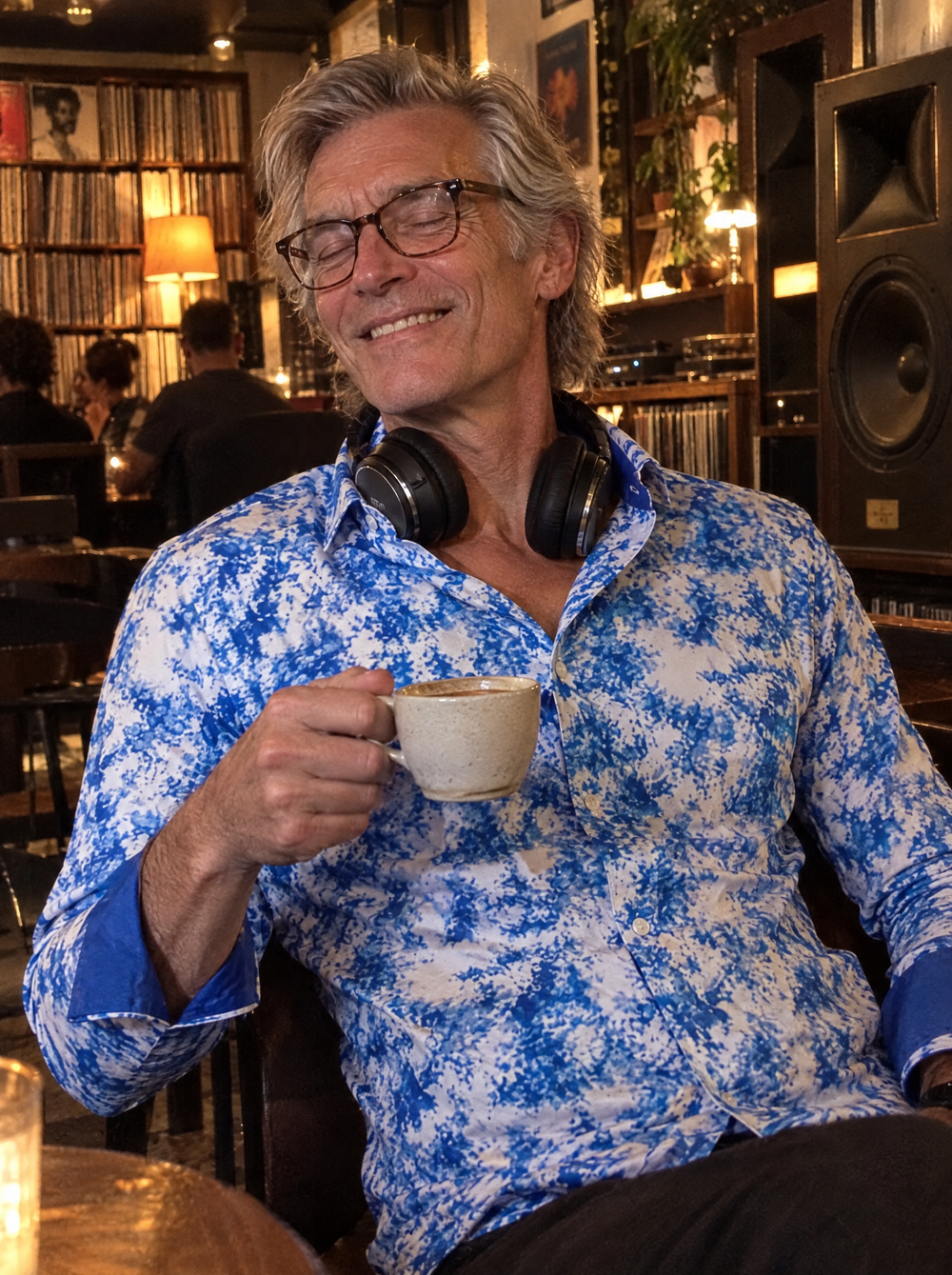 Man wearing the Mistwave shirt in a listening bar