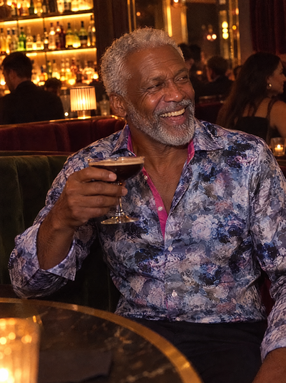 Man wearing the Phantom Garden shirt in a cocktail bar