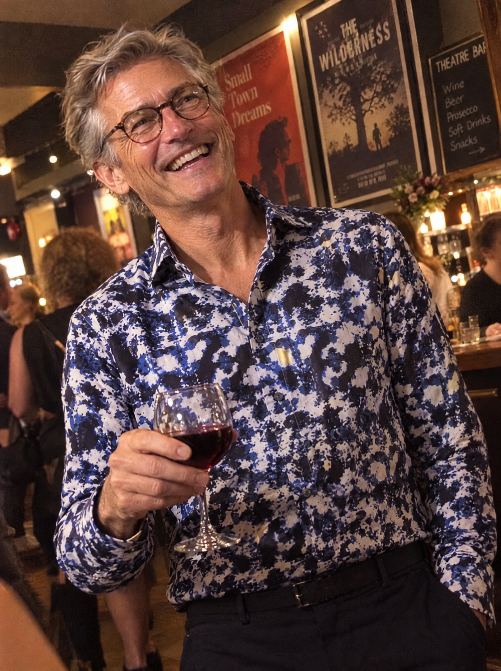 Man wearing The Rorschach shirt in a theatre bar