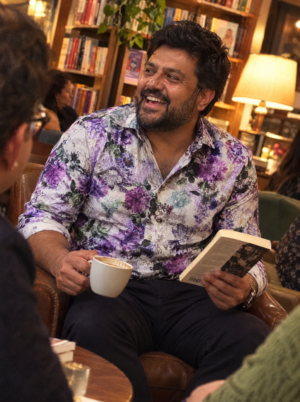 Man wearing the Tyrian Morphology shirt at a book club