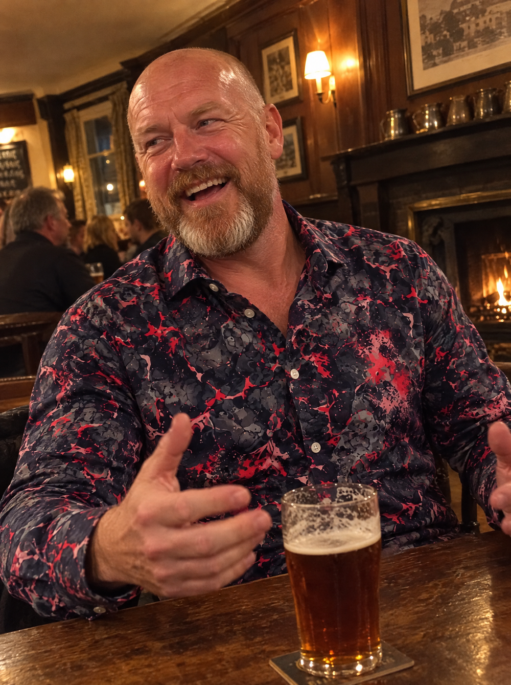 Man wearing the Volcano (Red) shirt in a traditional pub