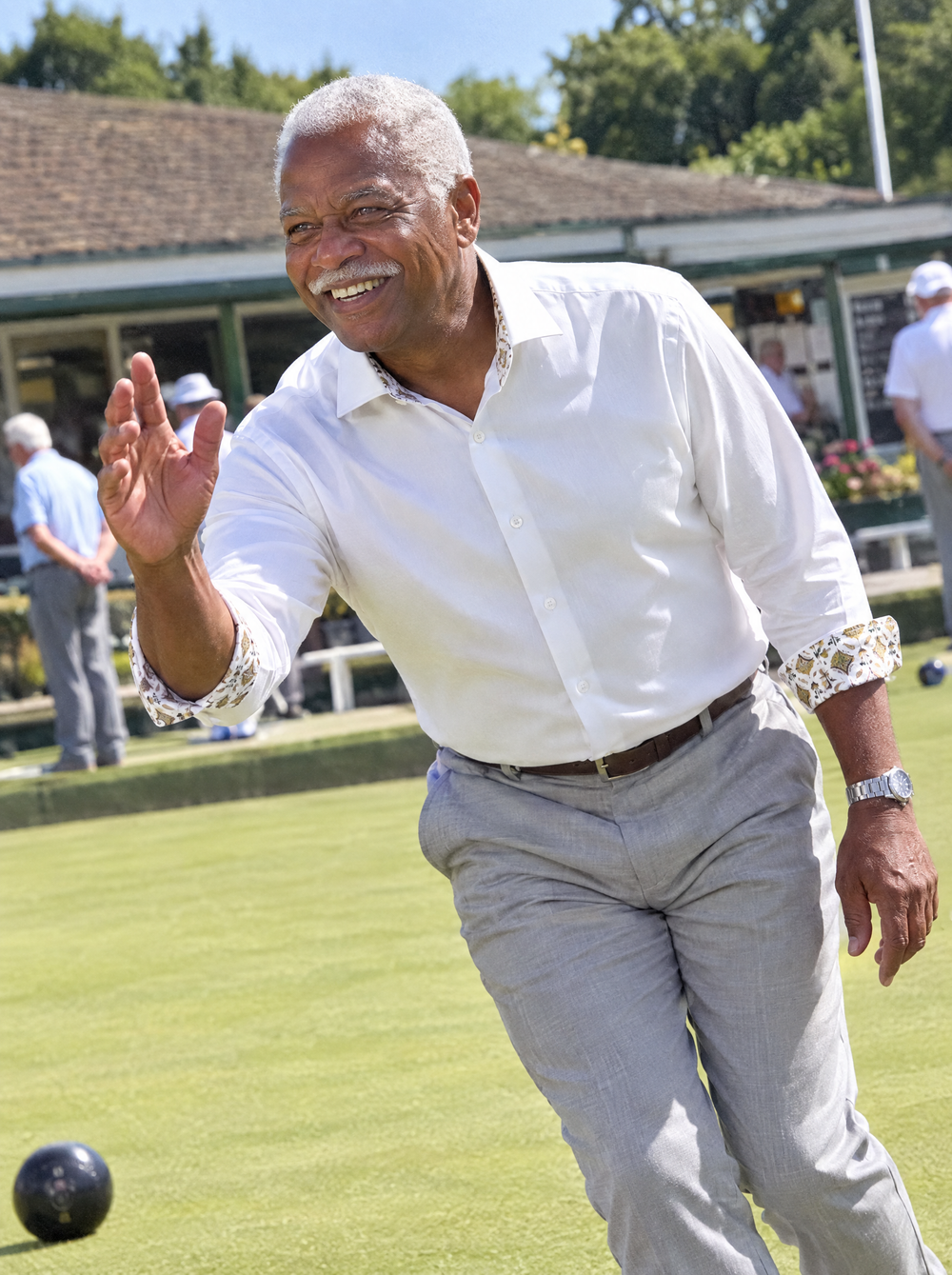 Man wearing the White Sateen shirt with Yellow Flora Accents at a bowls club
