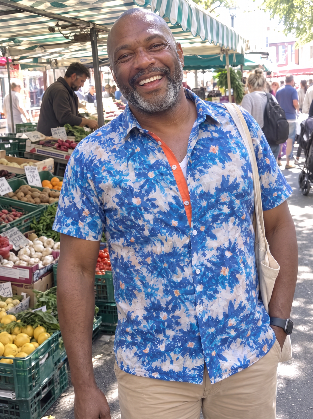 Man wearing the Aegean Bloom Short Sleeve Shirt at a produce market