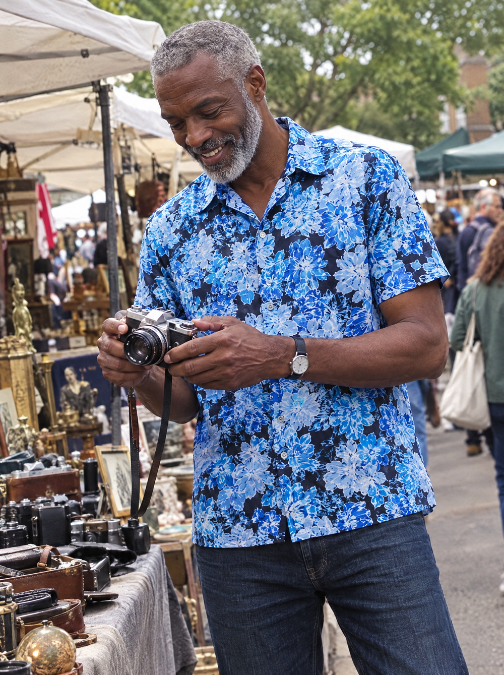 Man wearing The Blue Camellia Short Sleeve shirt at a vintage market