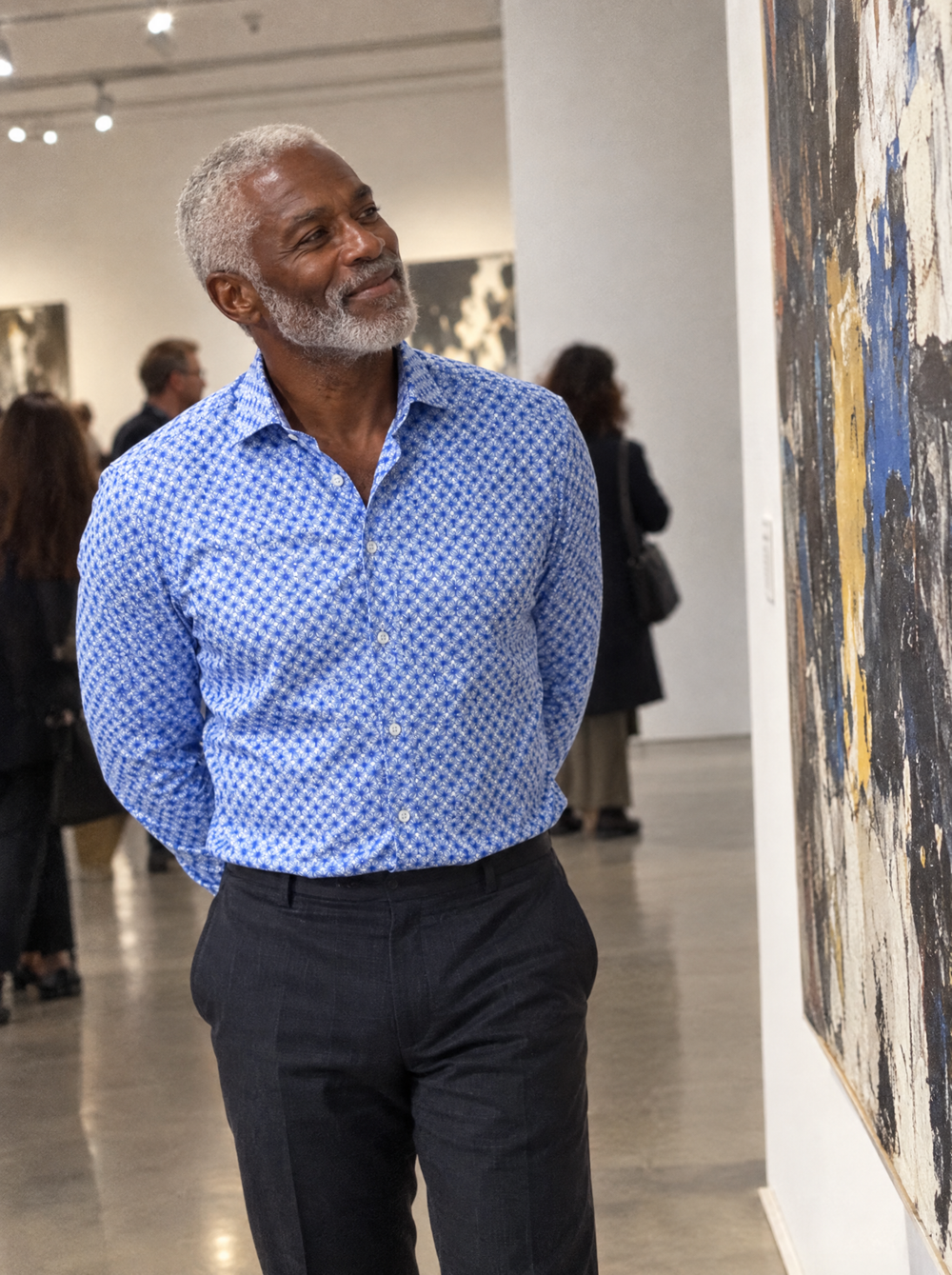 Man wearing the Blue Wavy Geo shirt in an art gallery