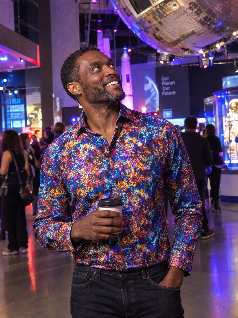 Man wearing the Brainstorm shirt at a science museum late