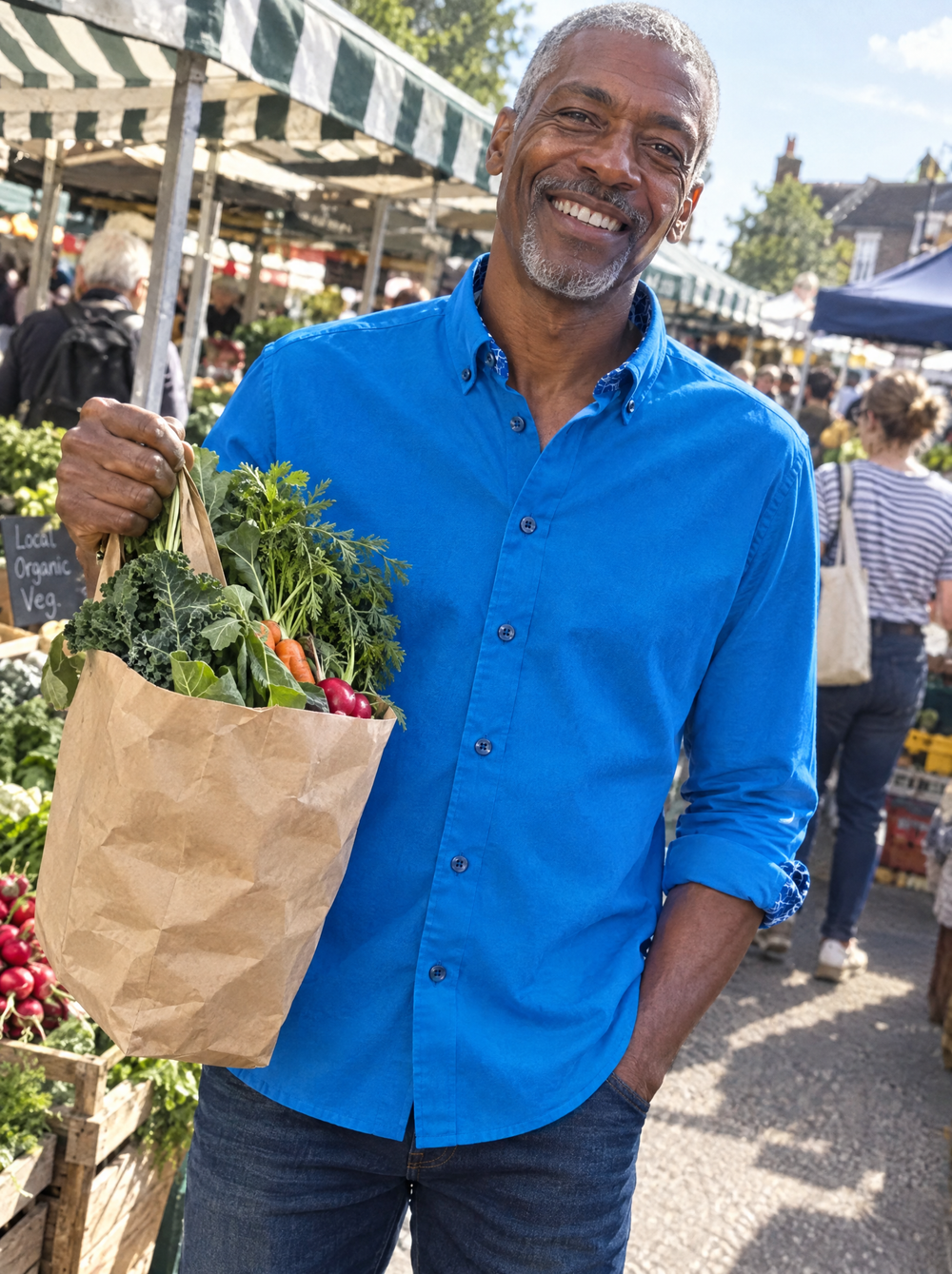 Man wearing the Cobalt Blue Oxford button-down shirt at a farmers' market