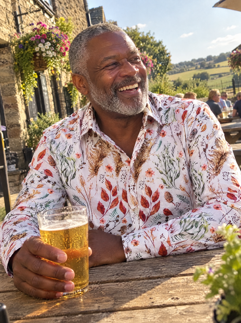 Man wearing the Field Notes shirt in a village pub garden
