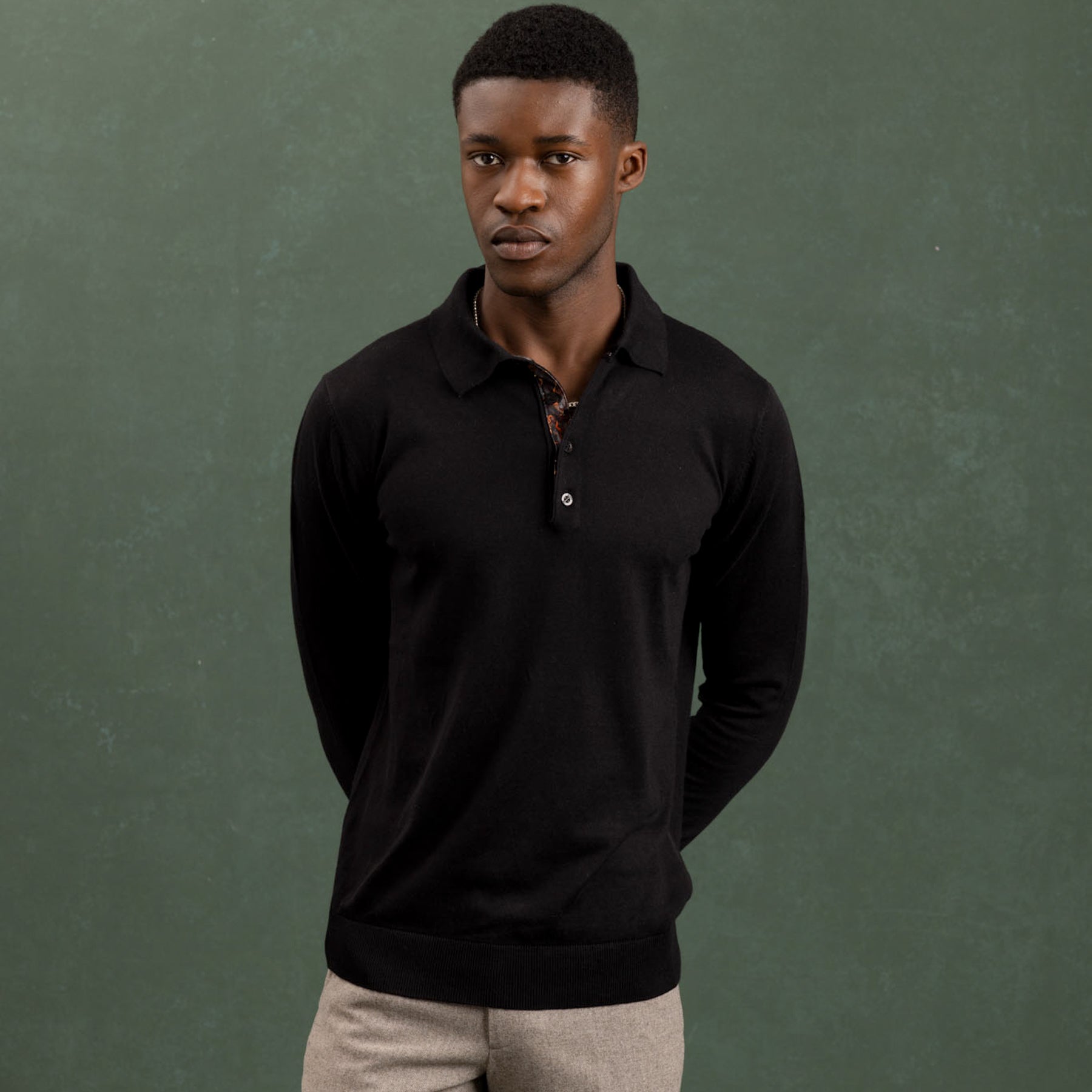 Black Knit Polo with Ripple Accents