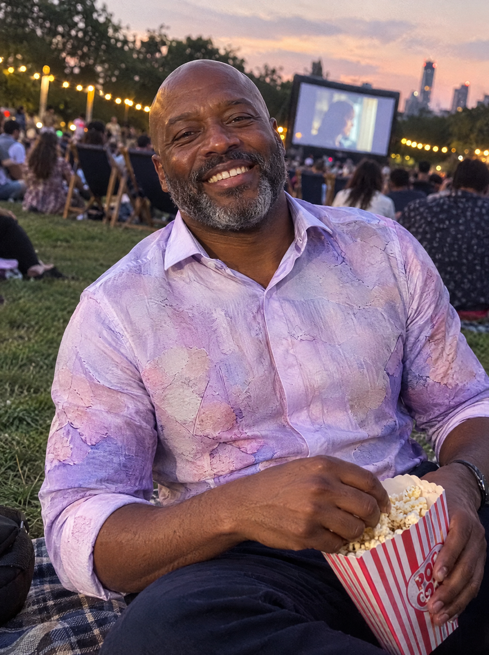 Man wearing the Forest of Dreams shirt at an outdoor cinema