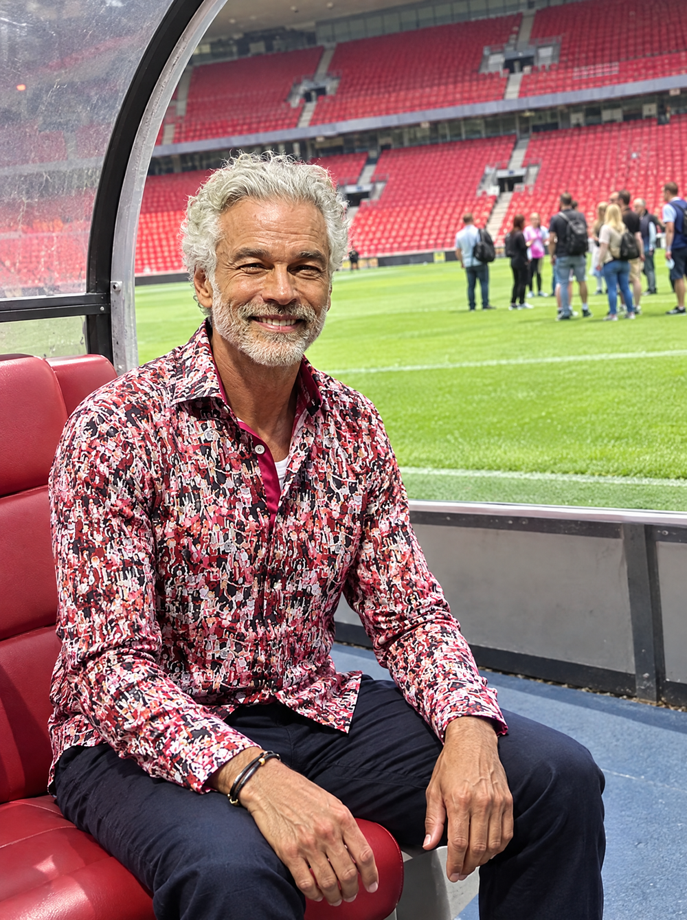 Man wearing the Matchday (Red) shirt on a stadium tour