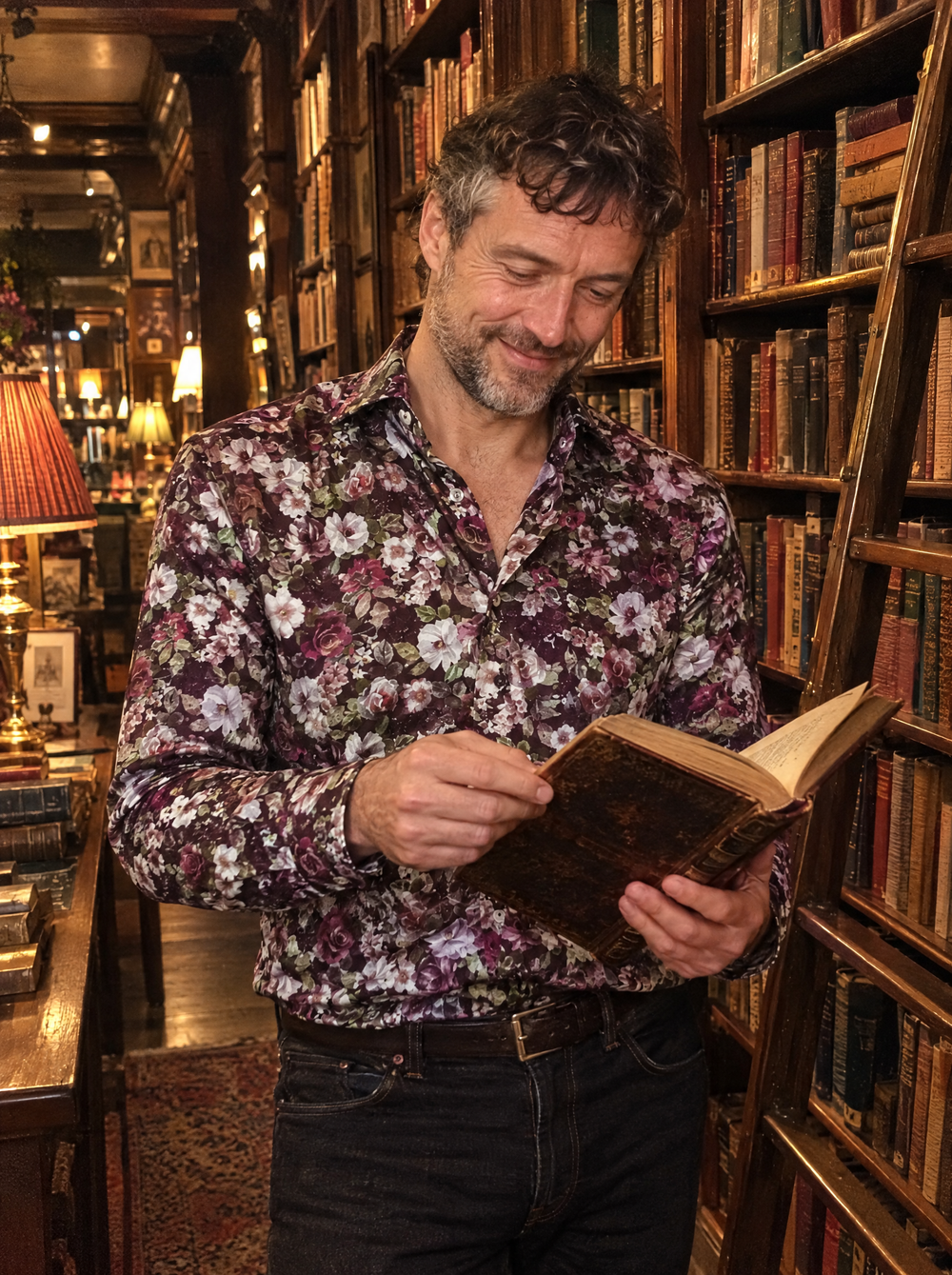 Man wearing the Name Of The Rose shirt in an antiquarian bookshop