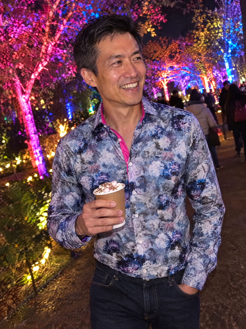 Man wearing the Phantom Garden shirt on a garden light trail