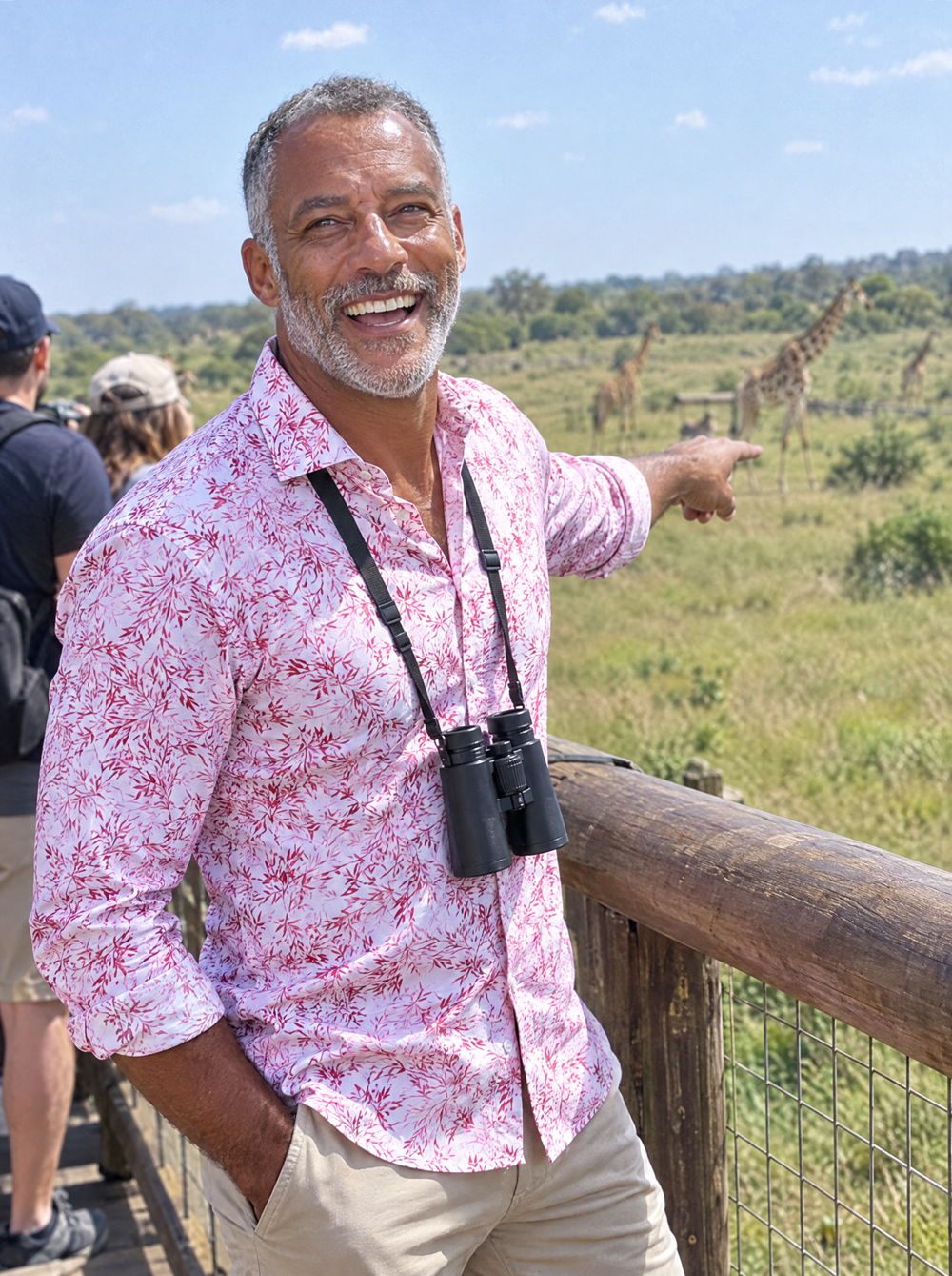 Man wearing the Pink Savanna shirt at a safari park