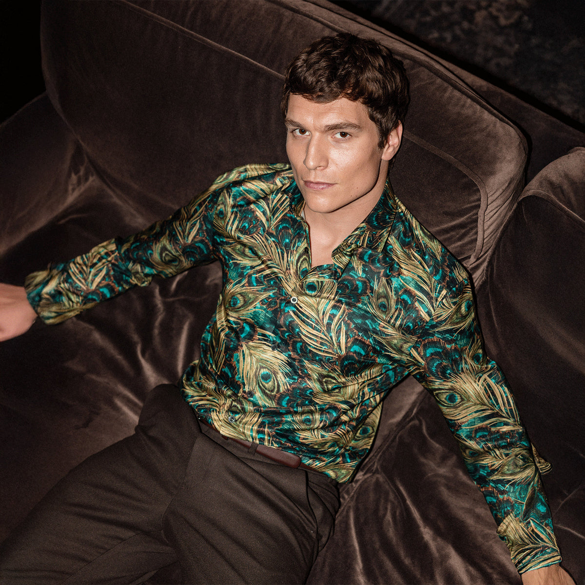 Man wearing a green printed Blake Mill shirt