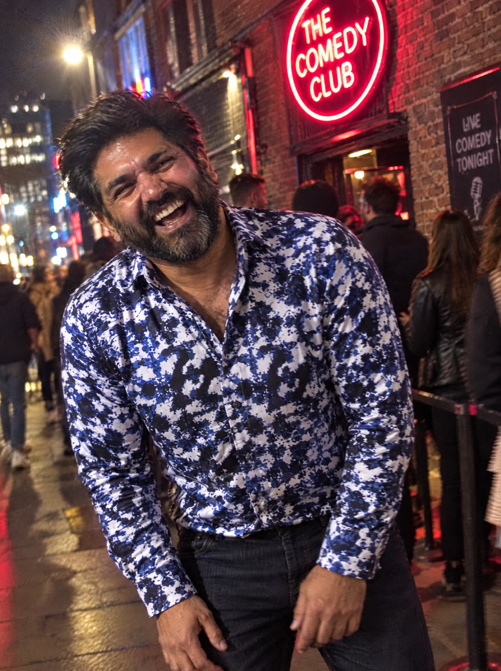 Man wearing The Rorschach shirt outside a comedy club