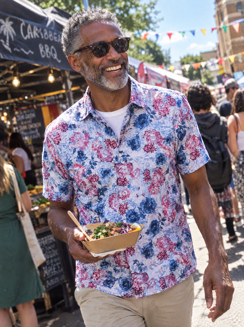 Man wearing The Roseate Linen Short Sleeve shirt at a street-food market