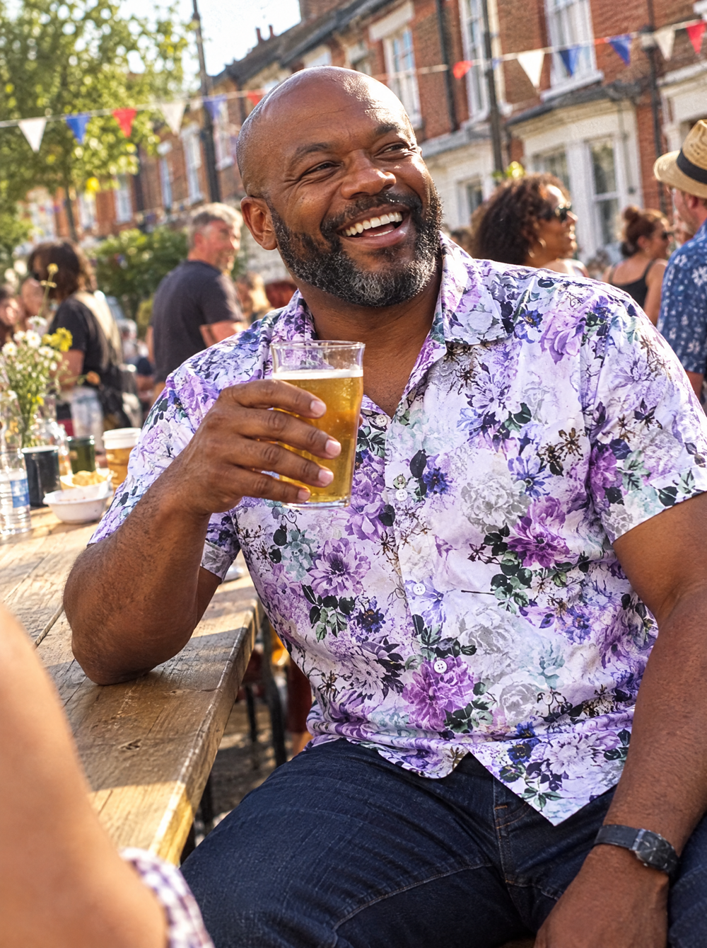 Man wearing the Tyrian Morphology Short Sleeve shirt at a street party