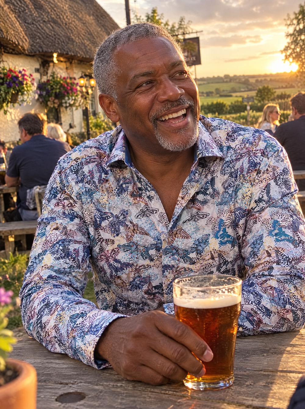 Man wearing the Wings Of A Butterfly shirt in a pub garden